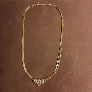 Vintage multi strand gold chain necklace with silver and gold rings